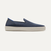 The Sneaker in Navy shown from the side.