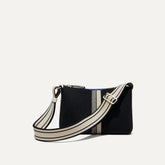 PLP |The Casual Crossbody in Black & Ivory Stripe, shown from the front.