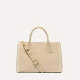 PLP |The Classic Handbag in Soft Sesame shown from the front.