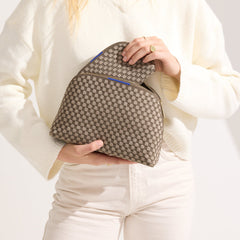 hover | Model shown holding the large and small pouch of The Vanity Set in Safari Green.