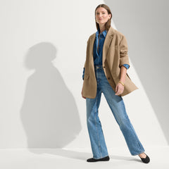 The Flat round toe shoe in Black Solid shown on-model in an alternate view.