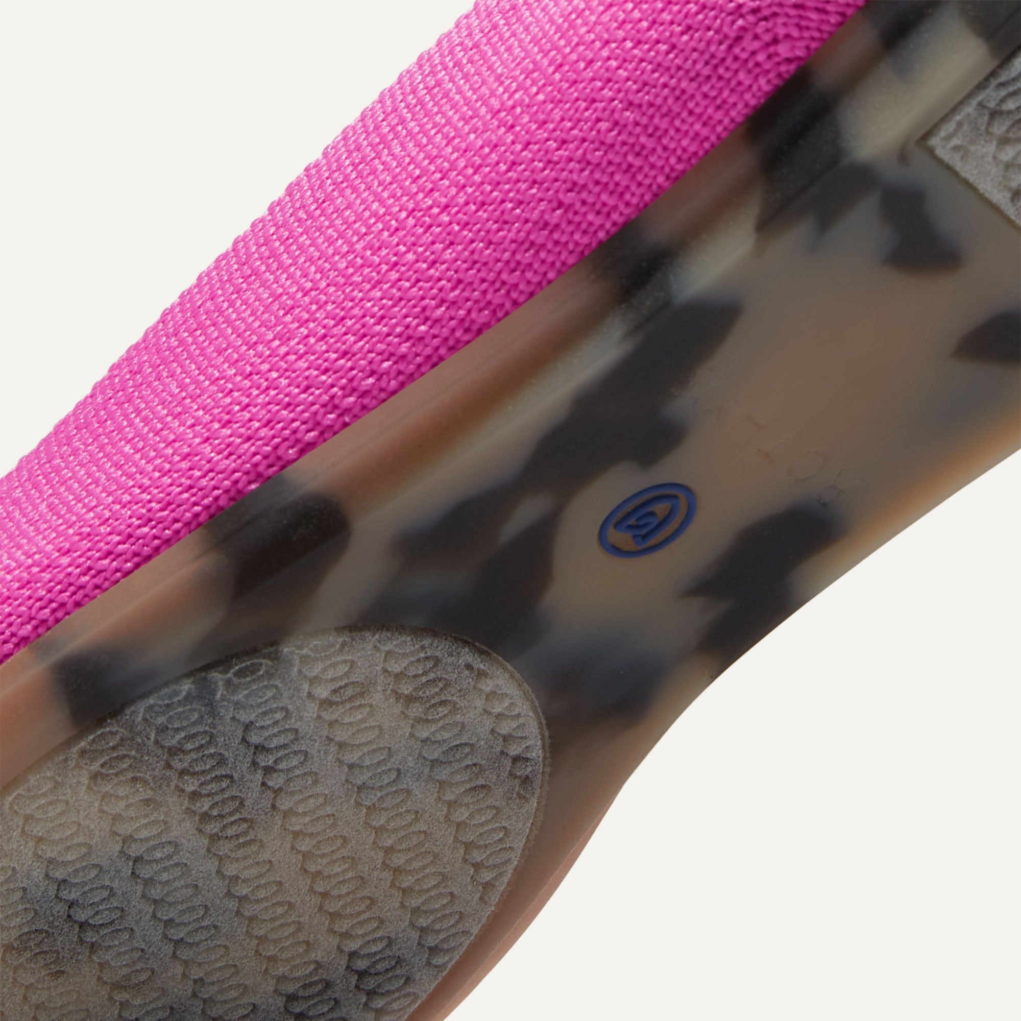 The sole of The Flat in Dragon Fruit shown in diagonal view.