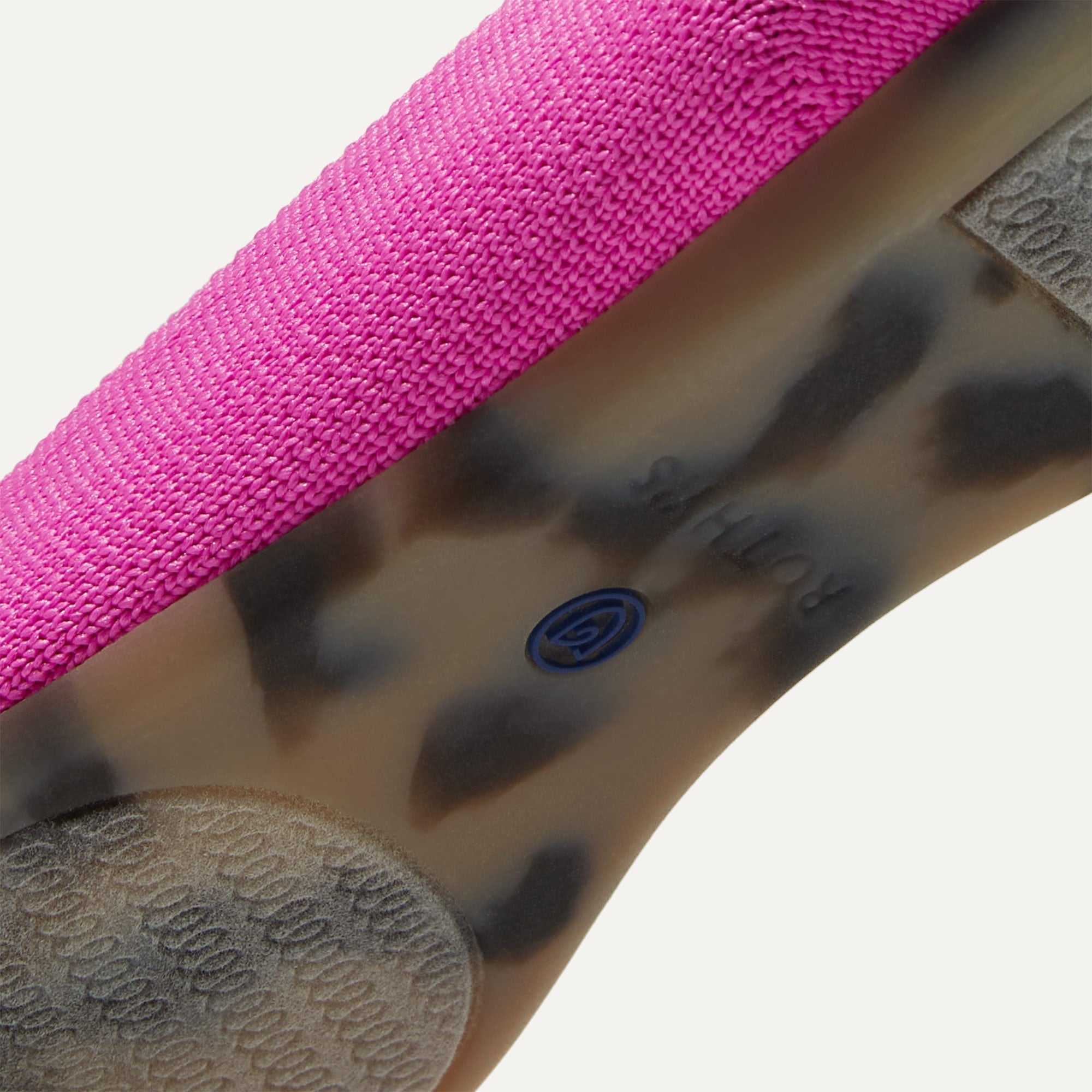 The sole of The Point in Dragon Fruit shown in diagonal view.