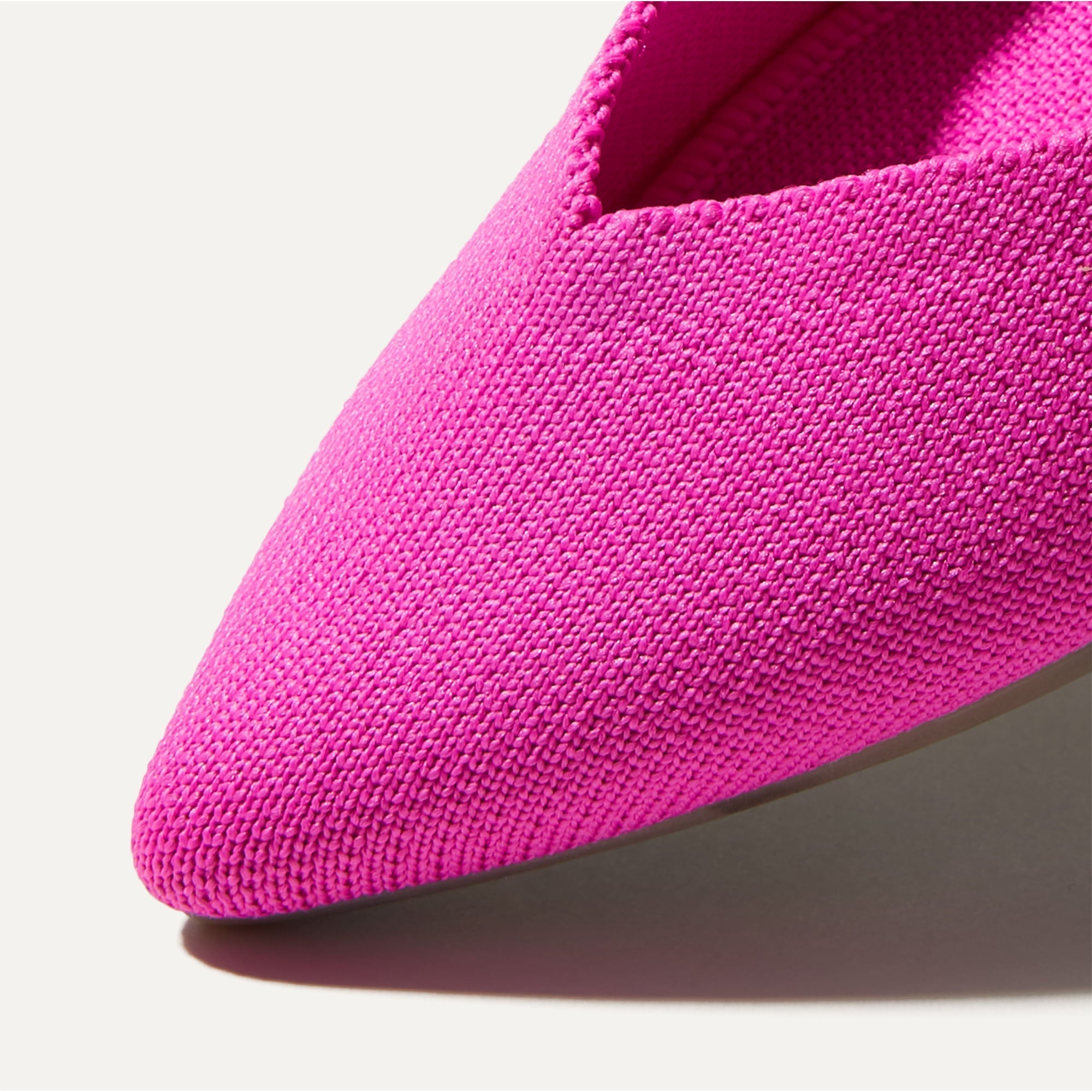 Close up of the pointed toe and v-shaped vamp of The Point in Dragon Fruit.