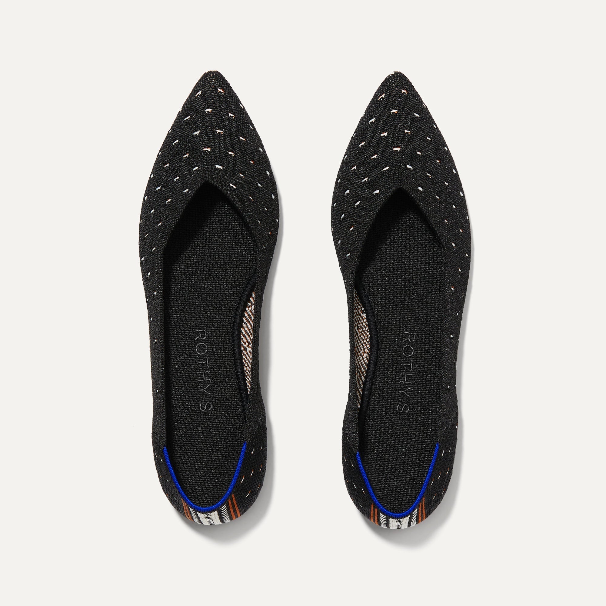 A pair of The Point shoe in Ivory Dot shown from the top view.