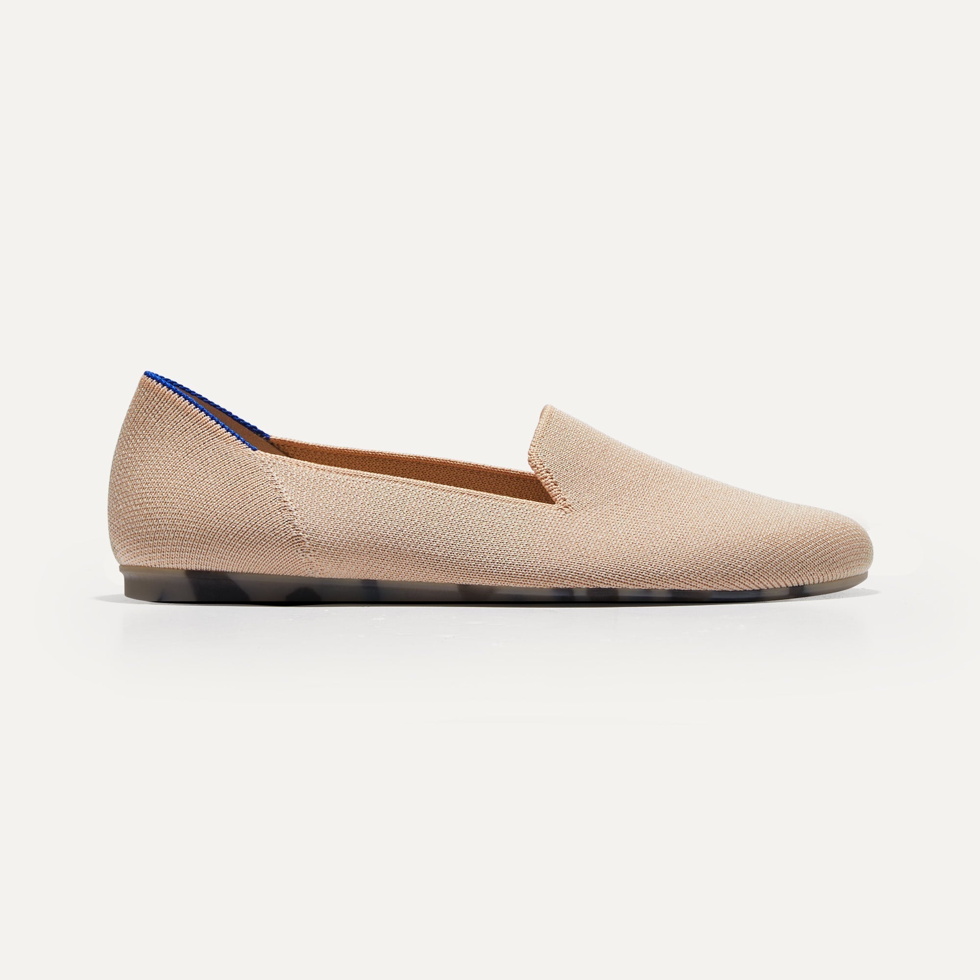The Loafer in Ecru shown from the side.