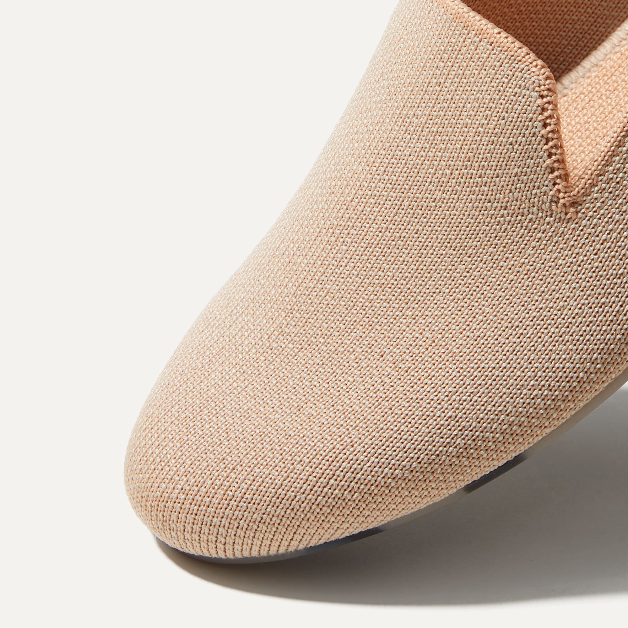 Close up of the toe and vamp of The Loafer in Ecru.