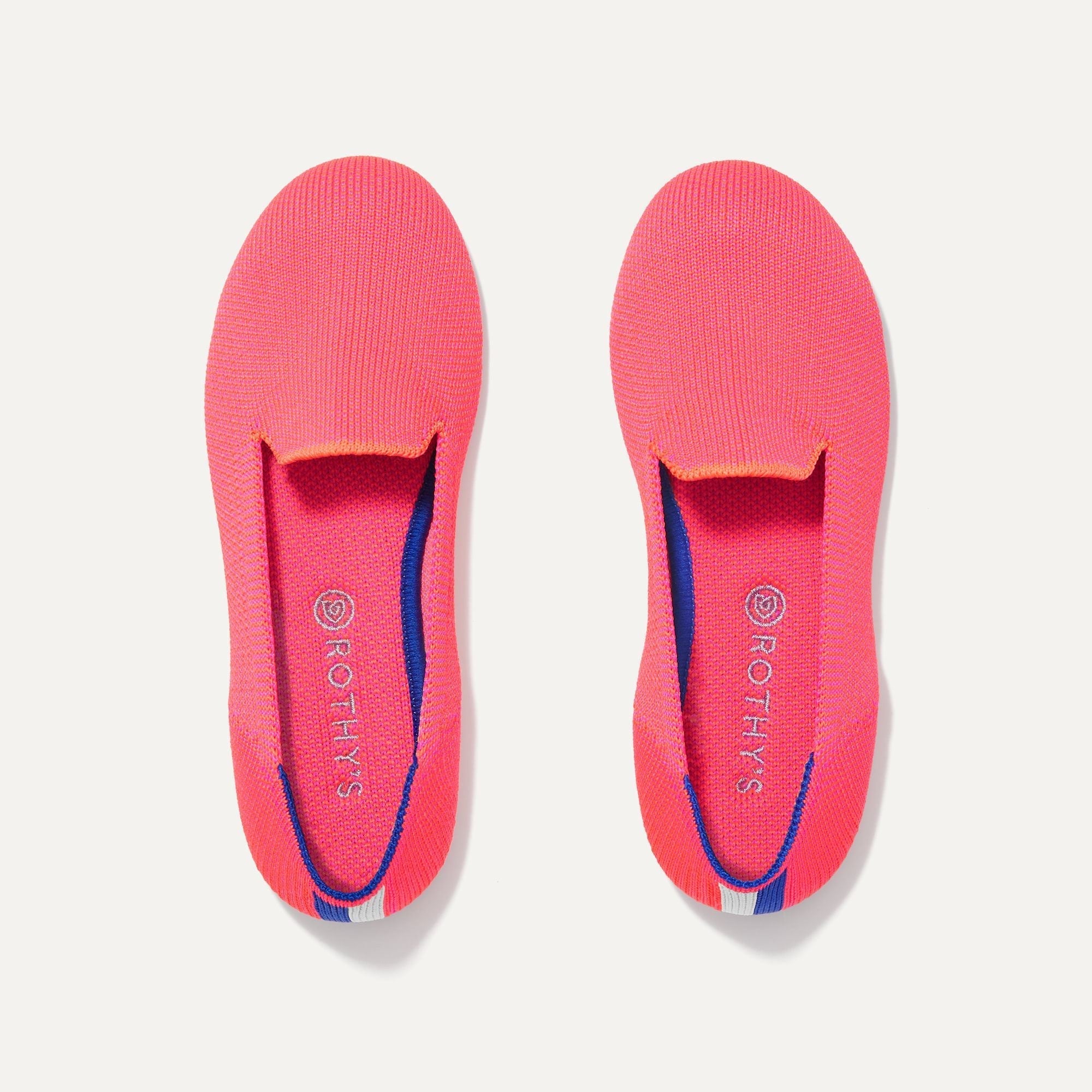 A pair of The Kids slip-on Loafers in Flamingo shown from the top view.