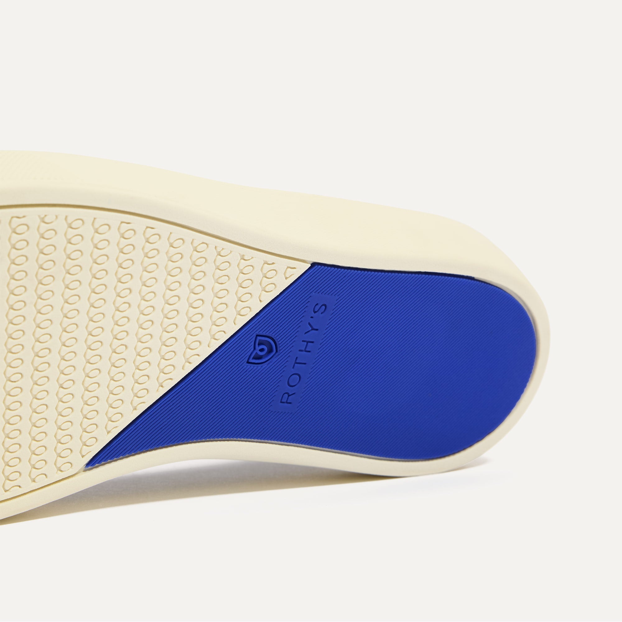 The sole of The Original Slip On Sneaker in Ace shown in diagonal view.