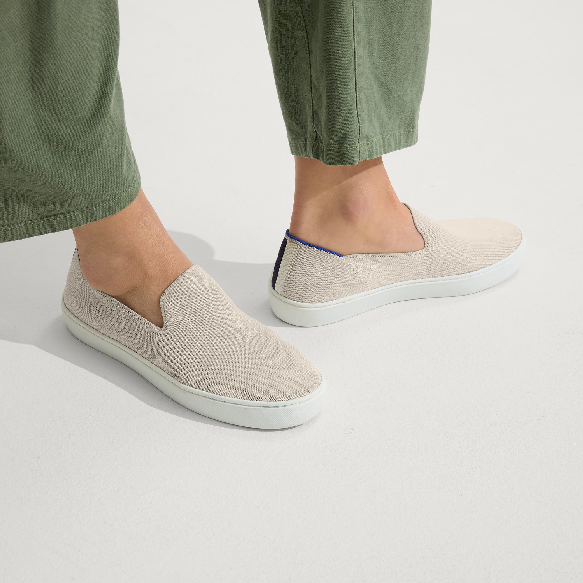 hover | The Original Slip On Sneaker in Sand shown on a model.