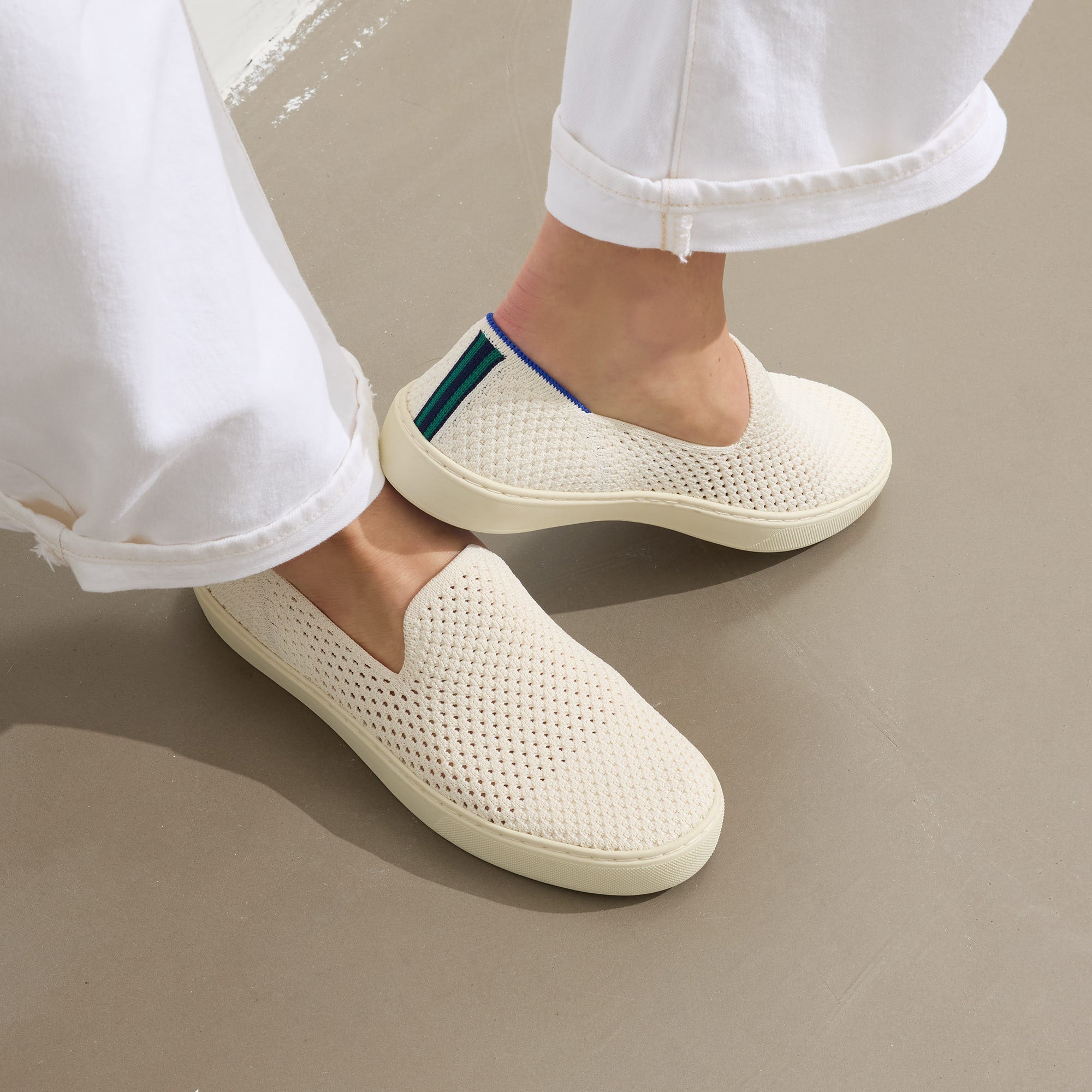 hover | Model wearing The Original Slip On Sneaker in Volley.