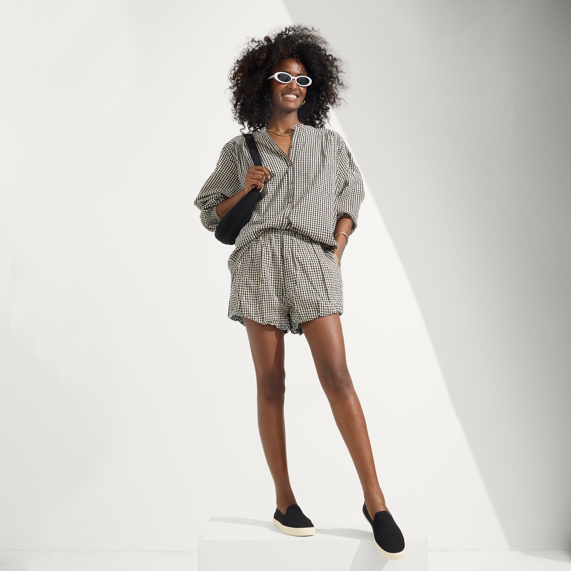 Alternate view of a model wearing The Original Slip On Sneaker in Ace.