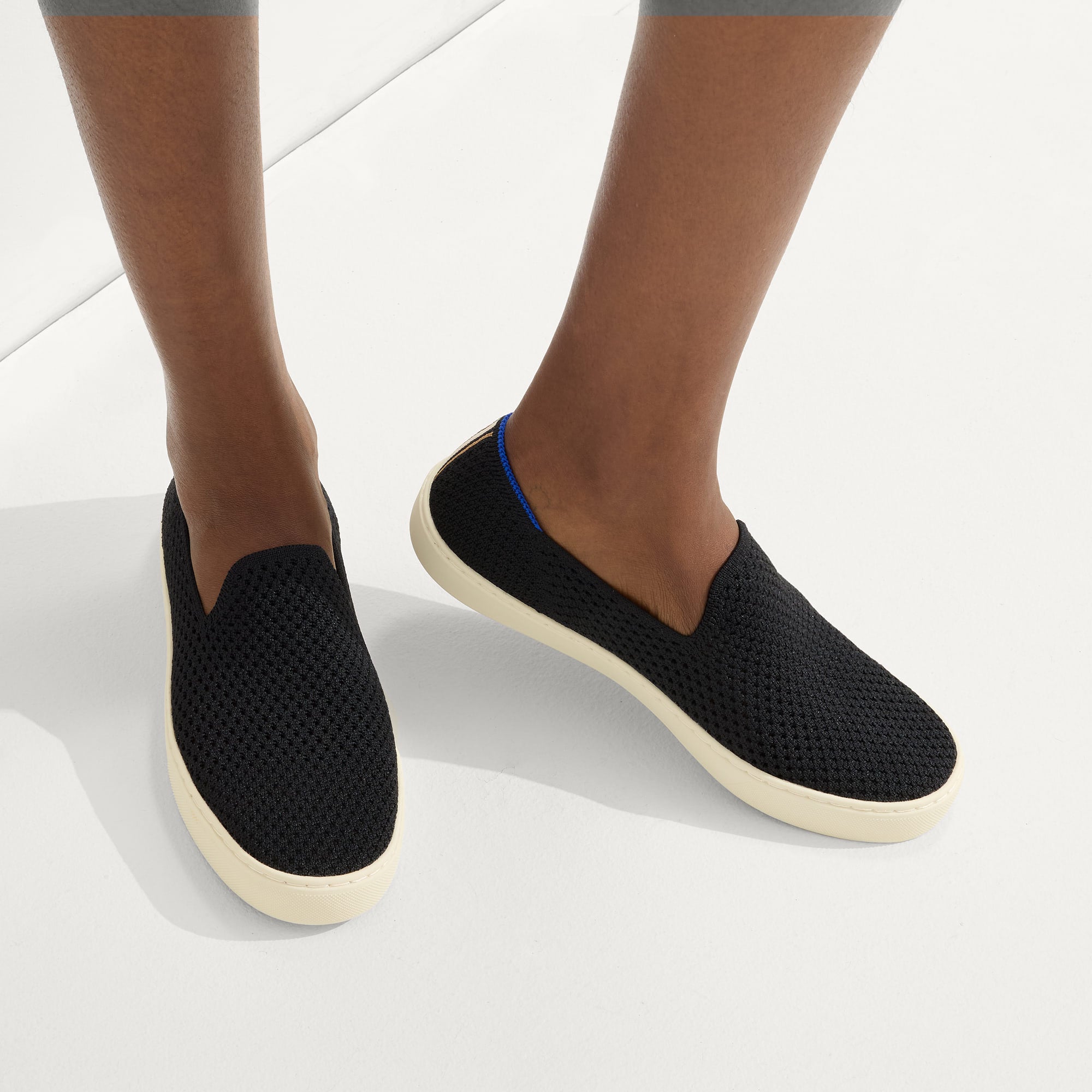 hover | Model wearing The Original Slip On Sneaker in Ace.