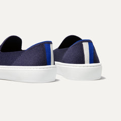 The Kids slip-on Sneaker in Deep Navy shown from the back view with the heel detail.