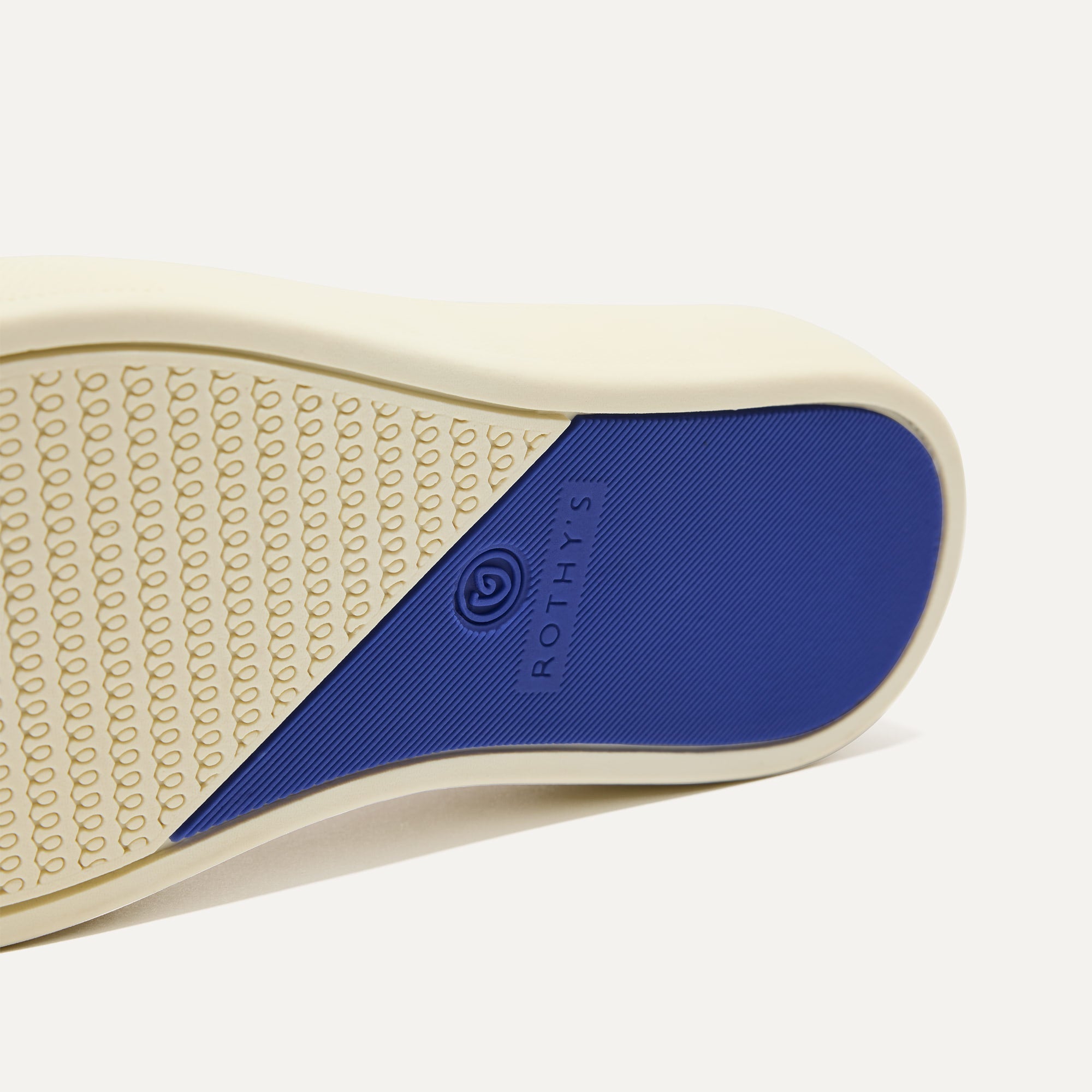 The sole of The Kids Sneaker in Sand.