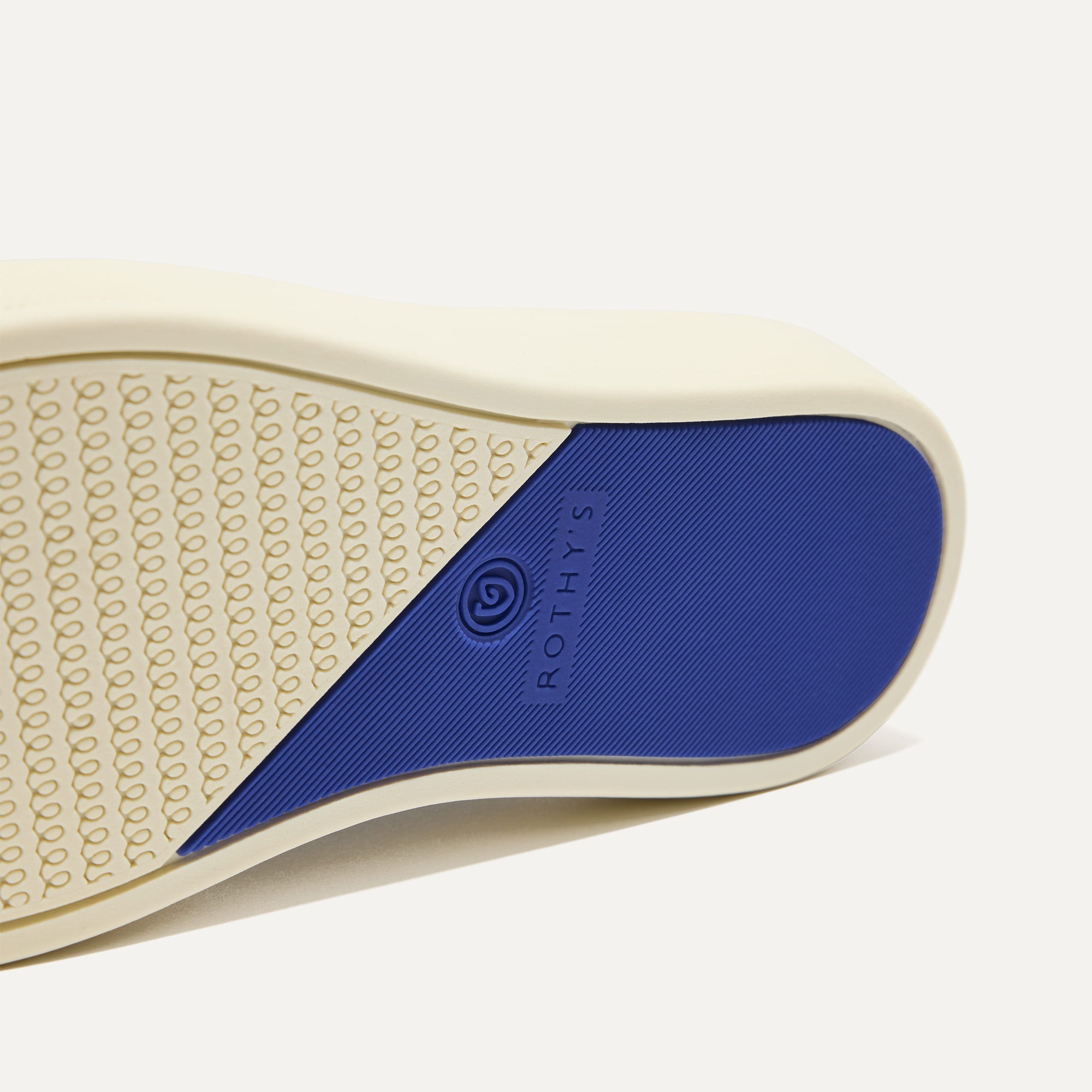 The sole of The Kids Sneaker in Spruce Camo.