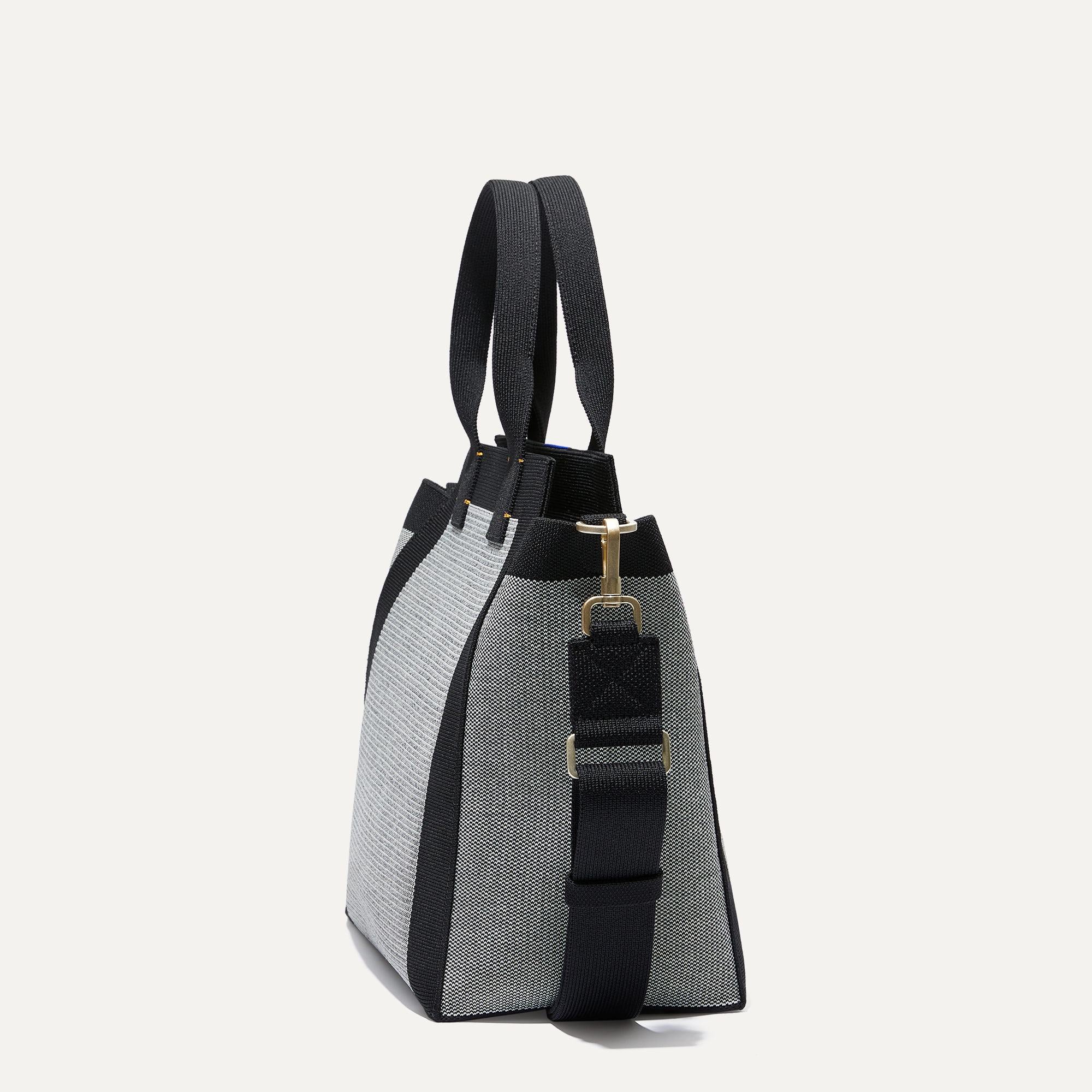 The Handbag in Grey Mist shown in diagonal view.