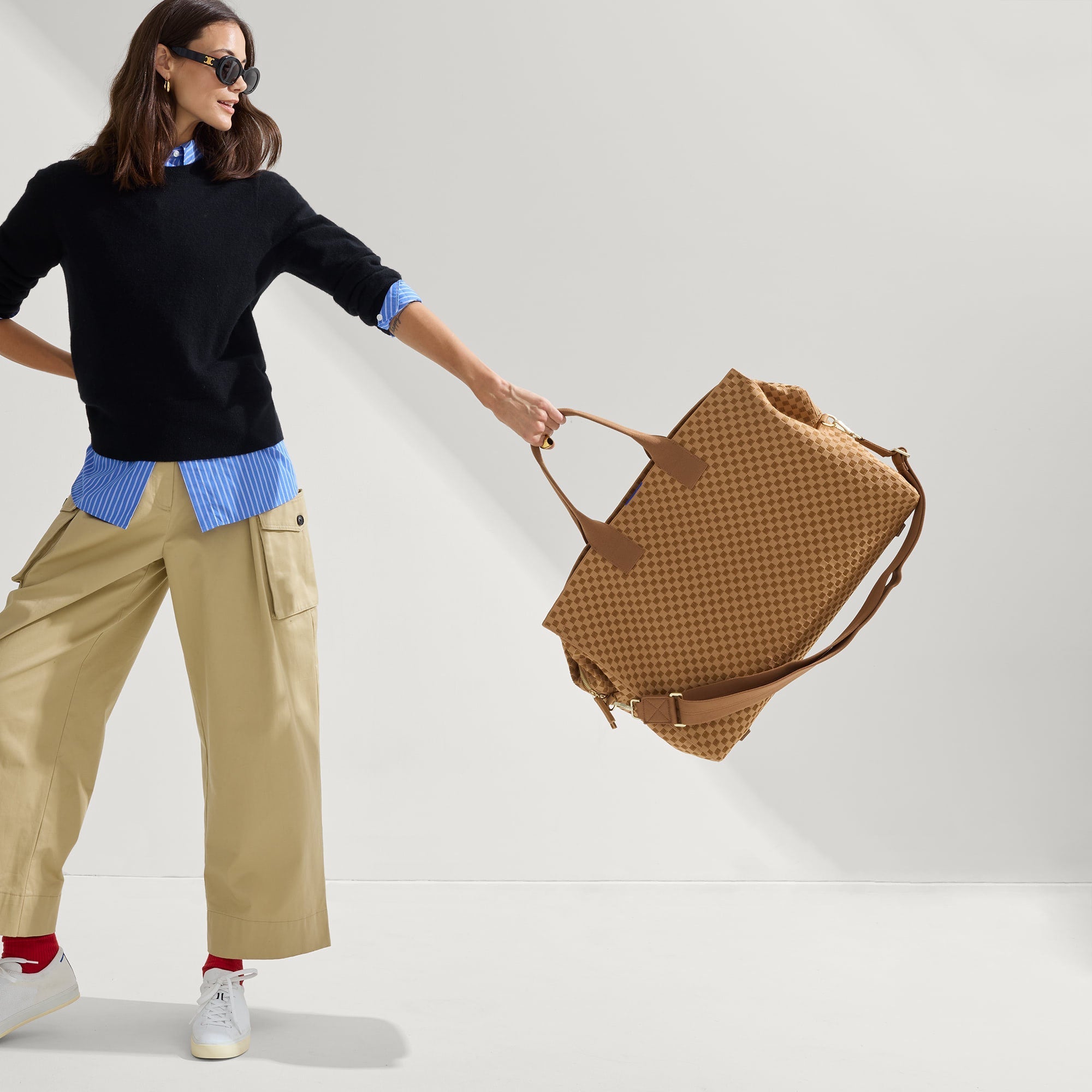 An alternate view of The Weekender in Hazelnut on a model.