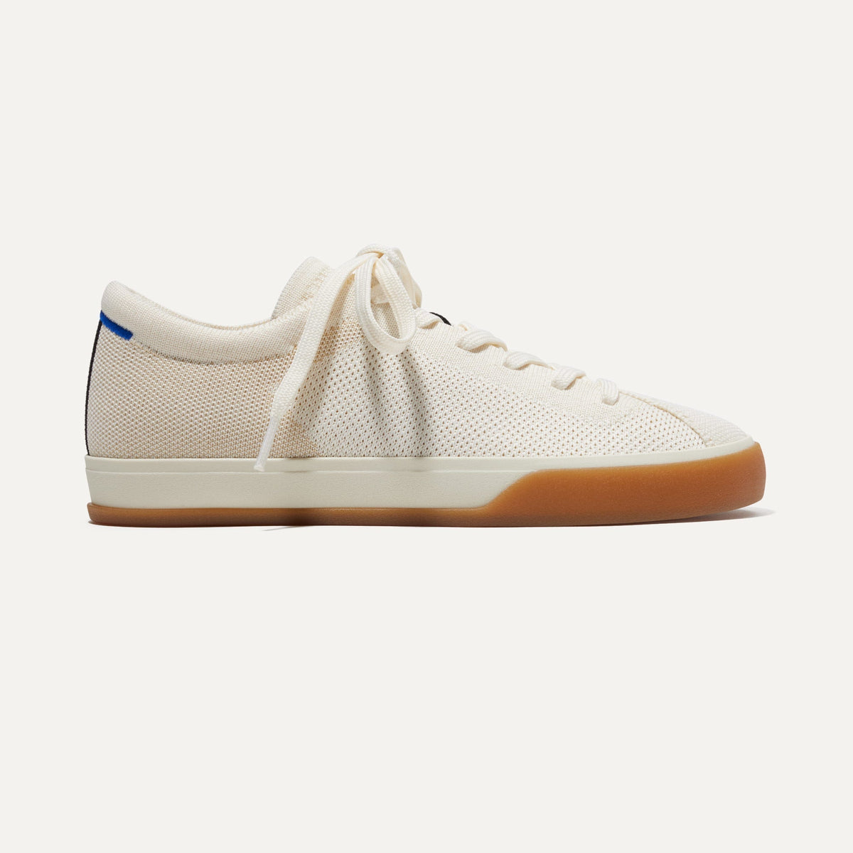 The Lace Up Sneaker in Blonde shown from the side.