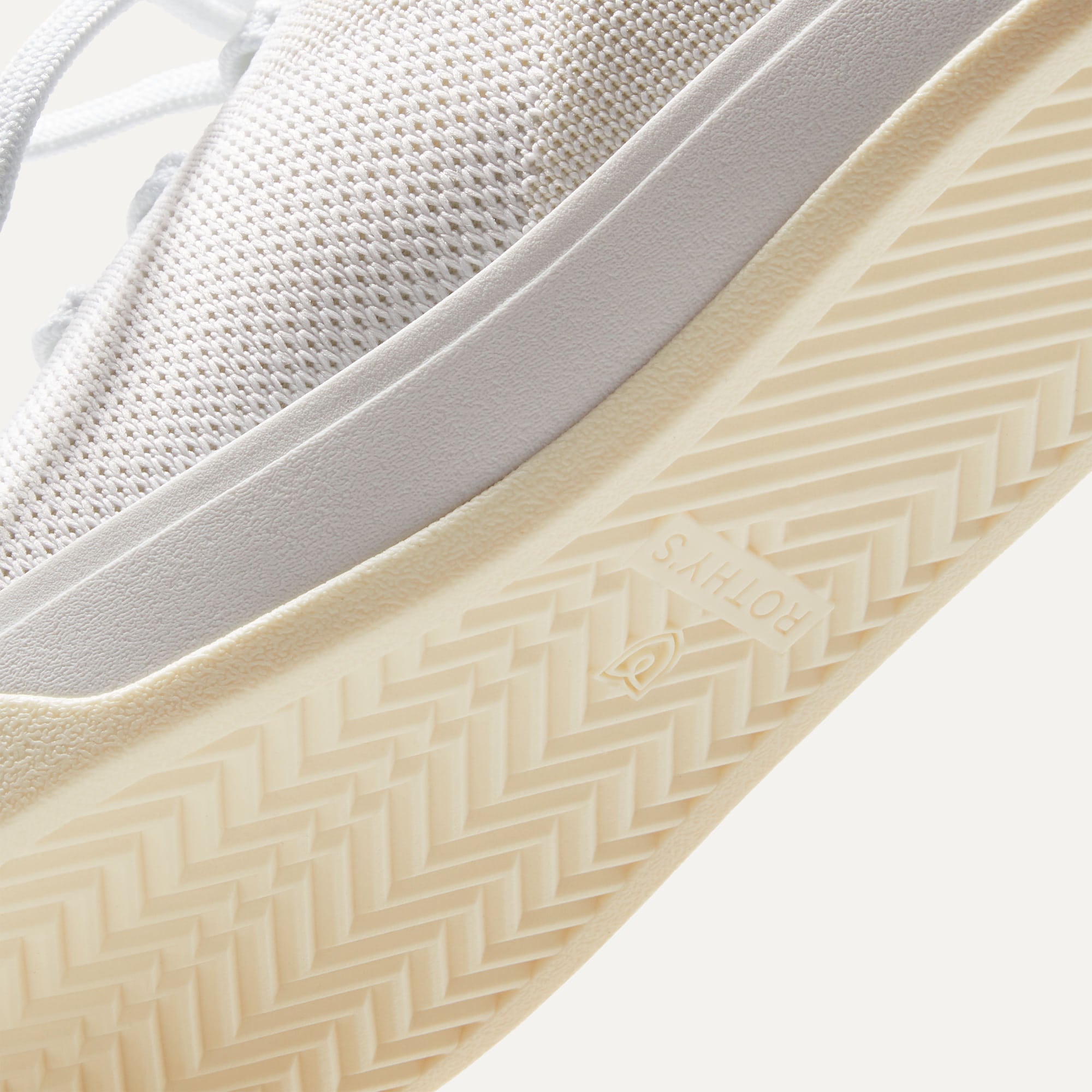 The sole of The Lace Up in Bright White shown in diagonal view.