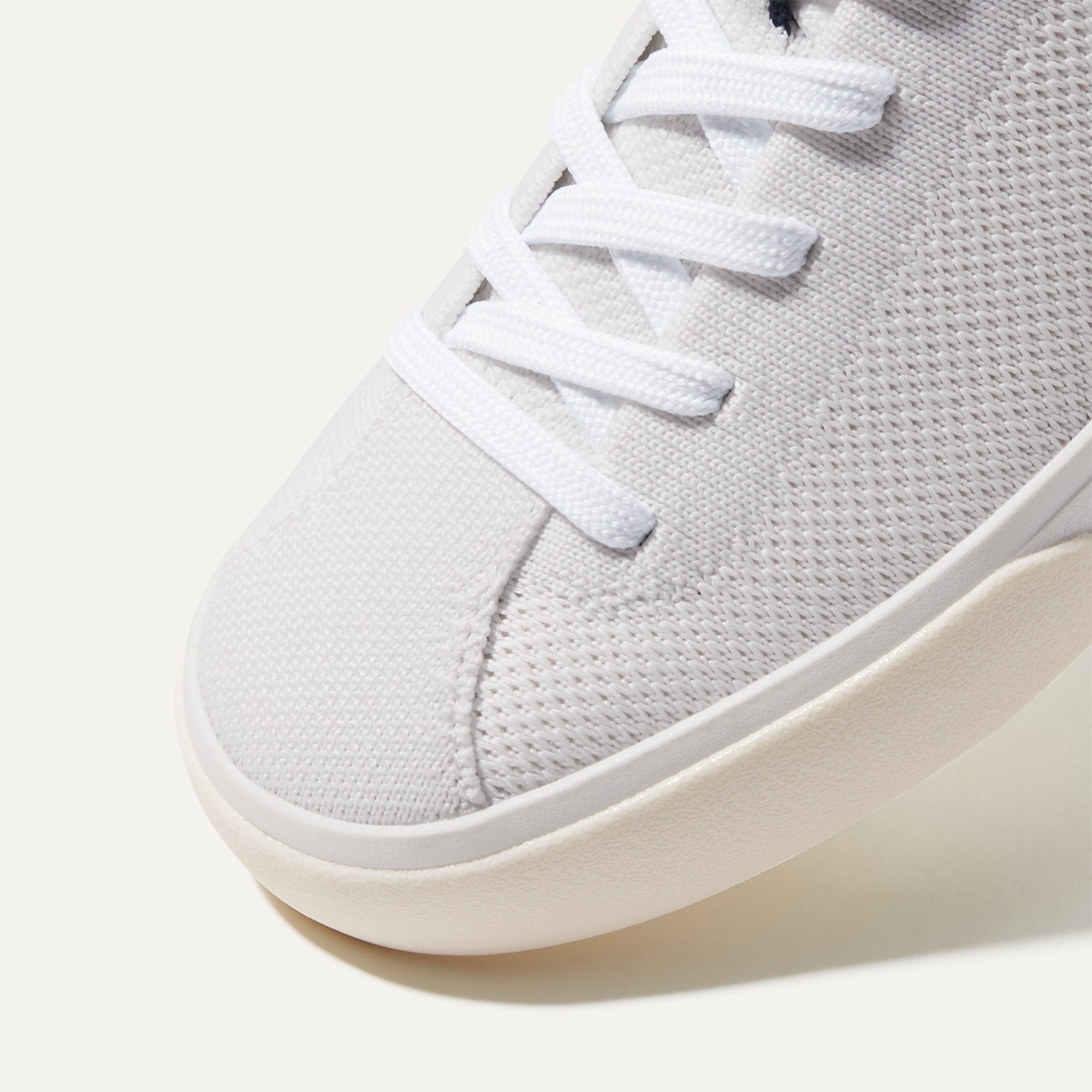 Close up of the toe and stitching details of The Lace Up in Bright White.