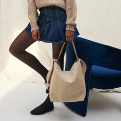 hover | The Bucket Bag in Knot Brown shown on model.