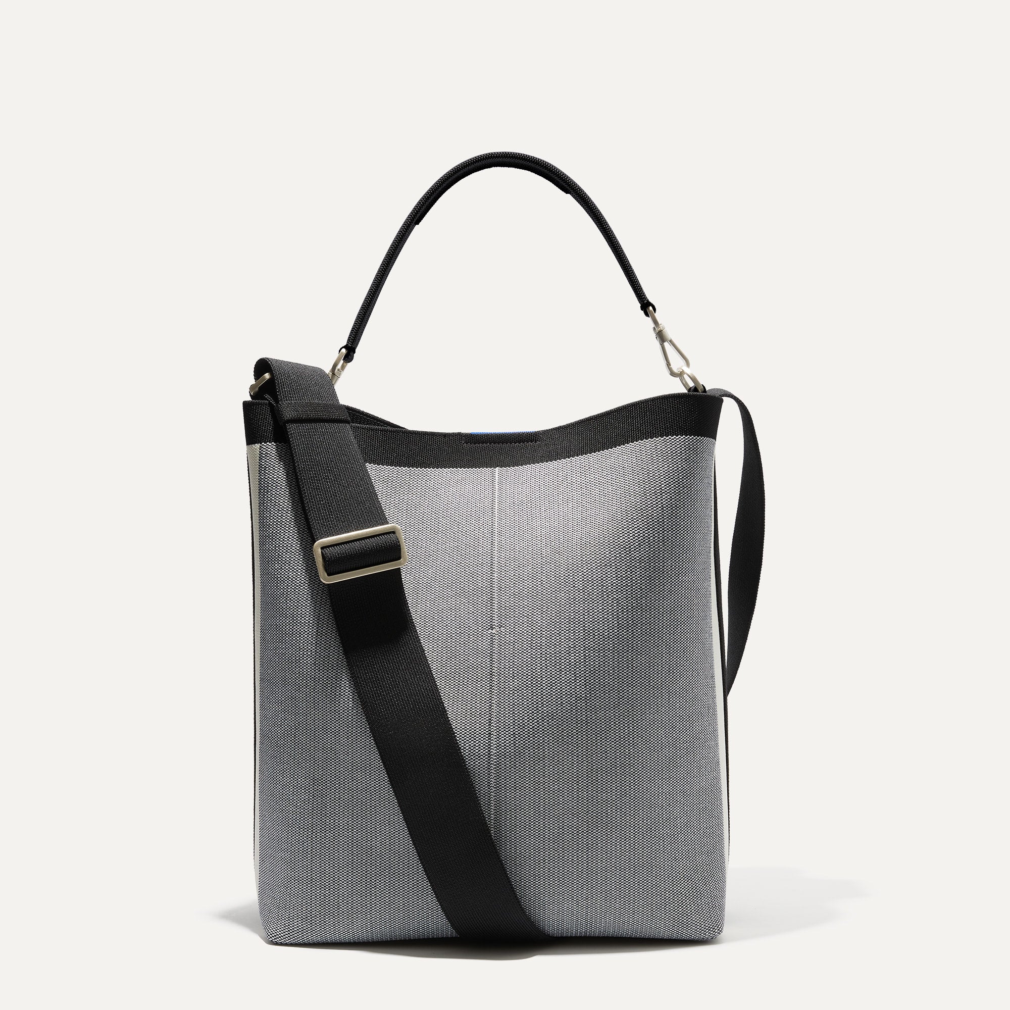 PLP |The Bucket Bag in Grey Mist shown from the front.