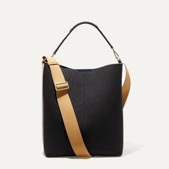 PLP | The Bucket Bag in Ink and Ivory shown from the front.