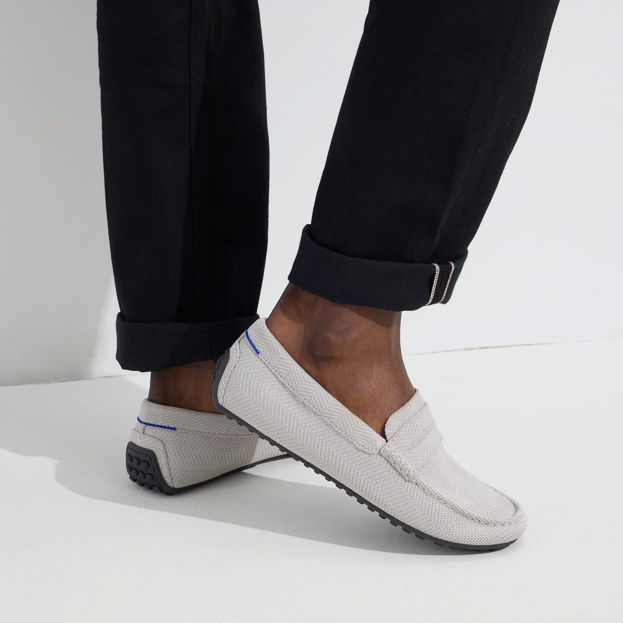 hover | Model wearing The Driving Loafer in Light Grey Herringbone.