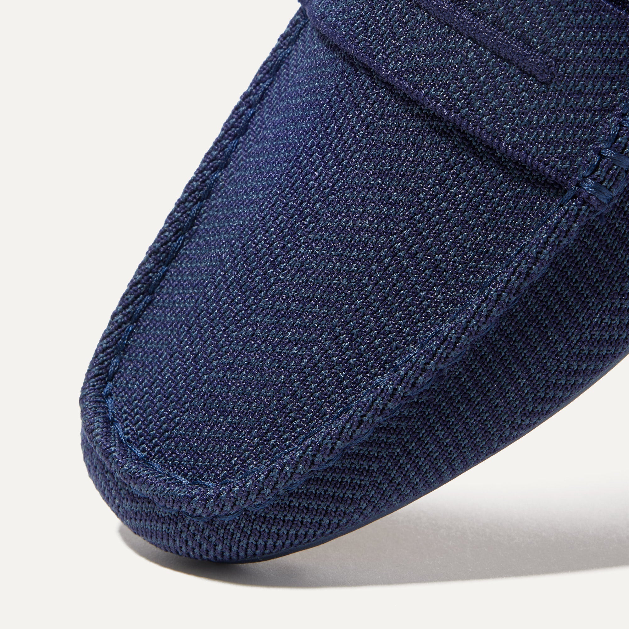 Close up of the toe and vamp of The Driving Loafer in Navy Herringbone.