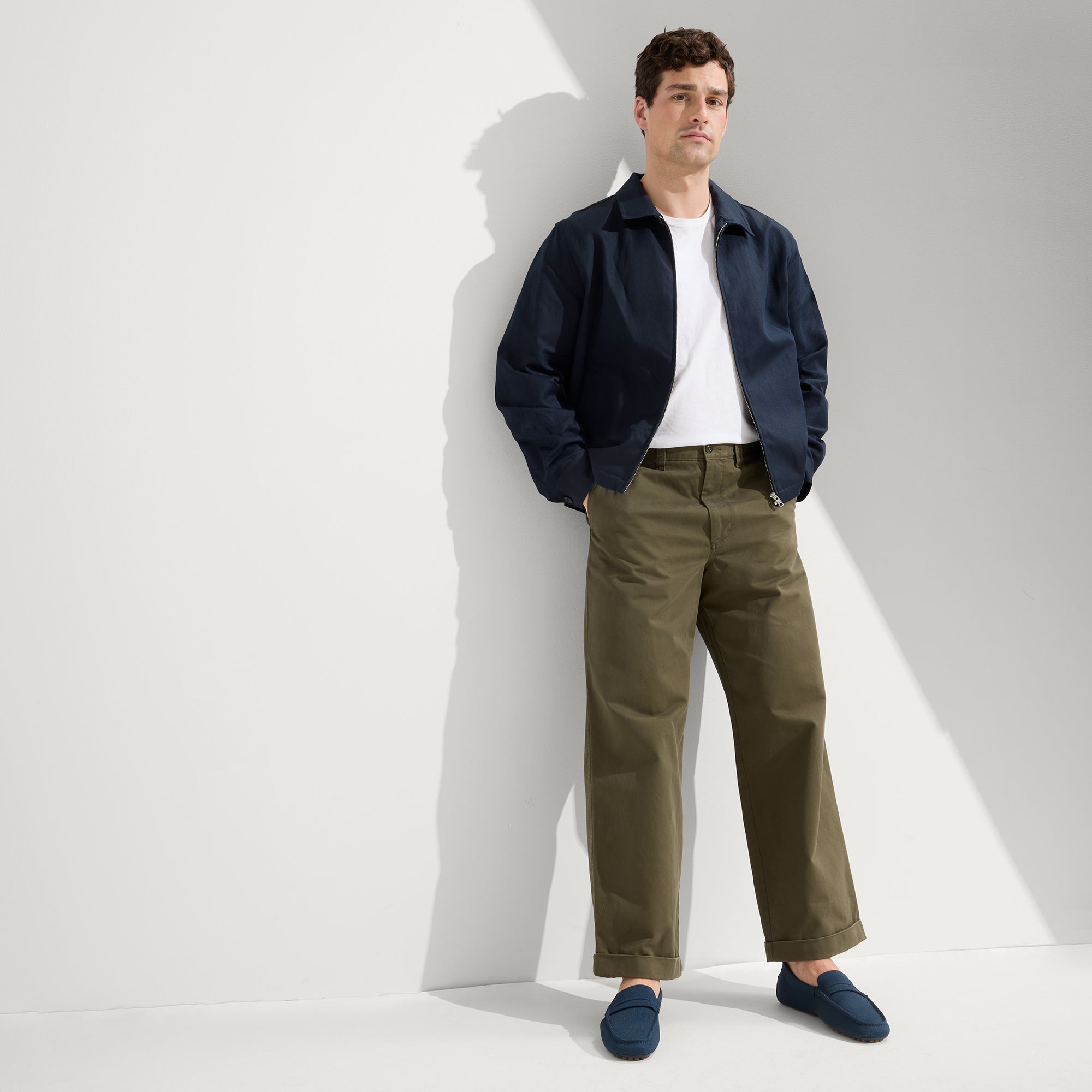 Alternate view of a model wearing The Driving Loafer in Navy.