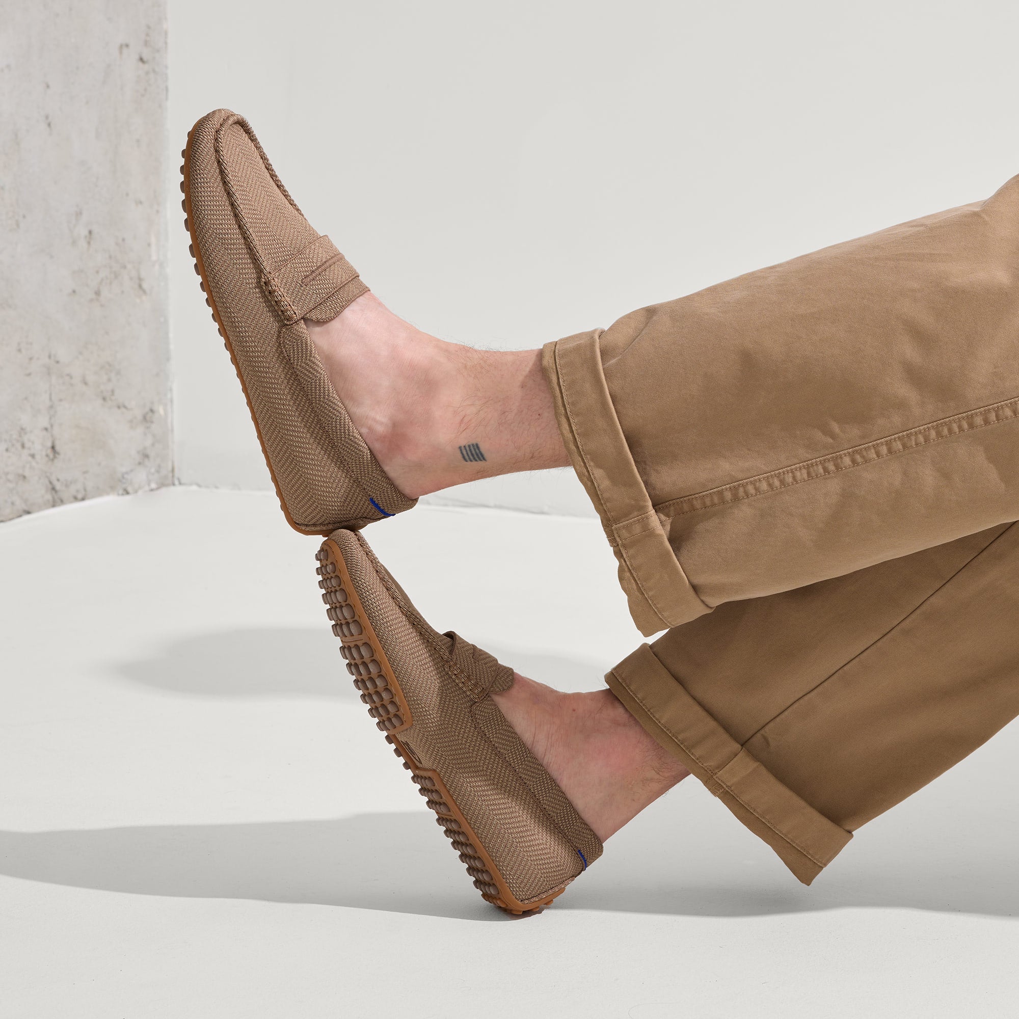 hover | Model wearing The Driving Loafer in Portobello Herringbone.