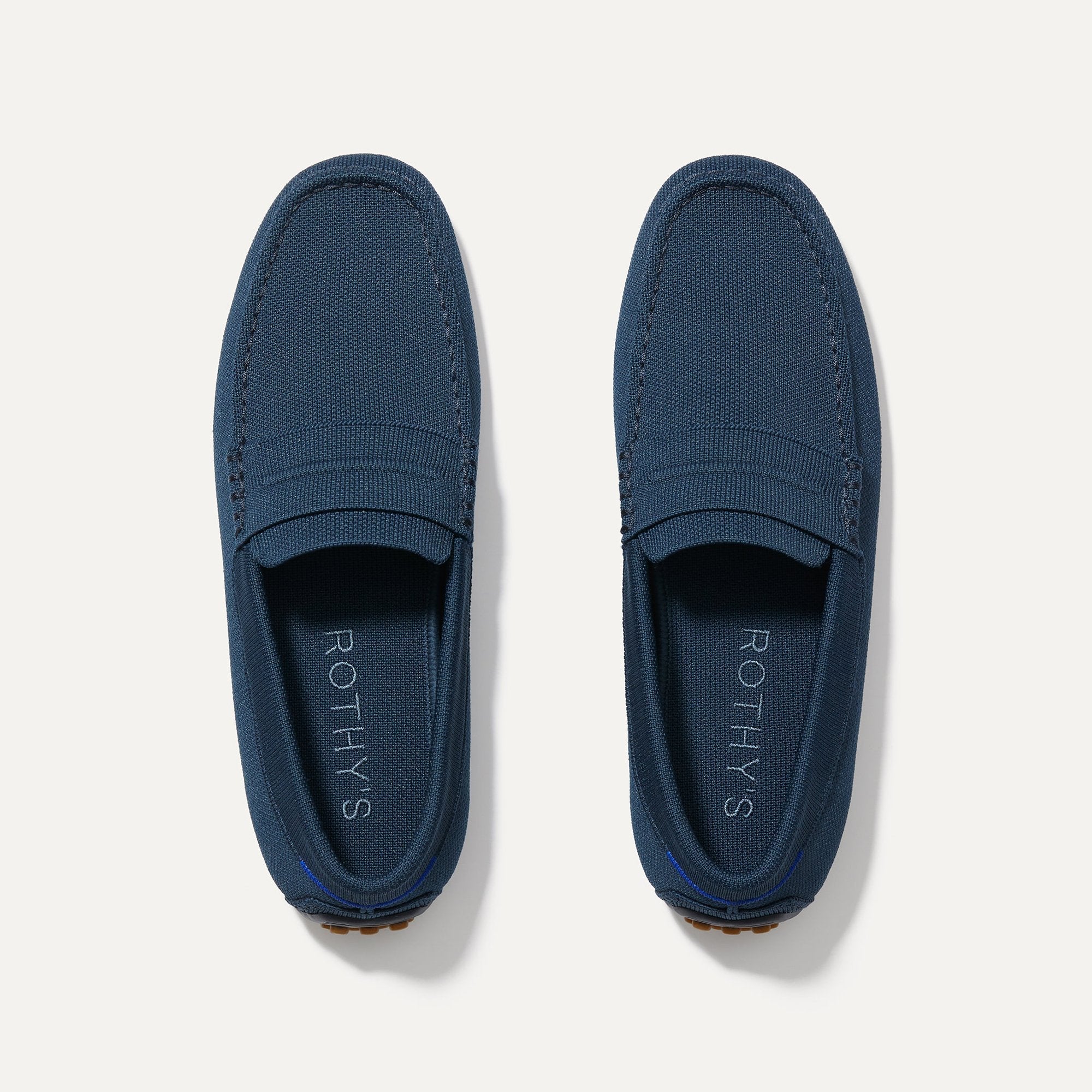 A pair of The Driving Loafer in Navy shown from the top.