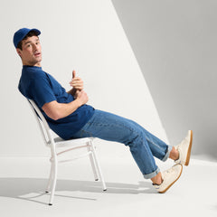 Alternate view of a model wearing The RS01 Sneaker in Bone.