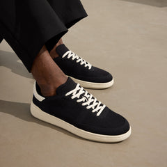 hover | Model wearing The Men's Court Sneaker in Referee.