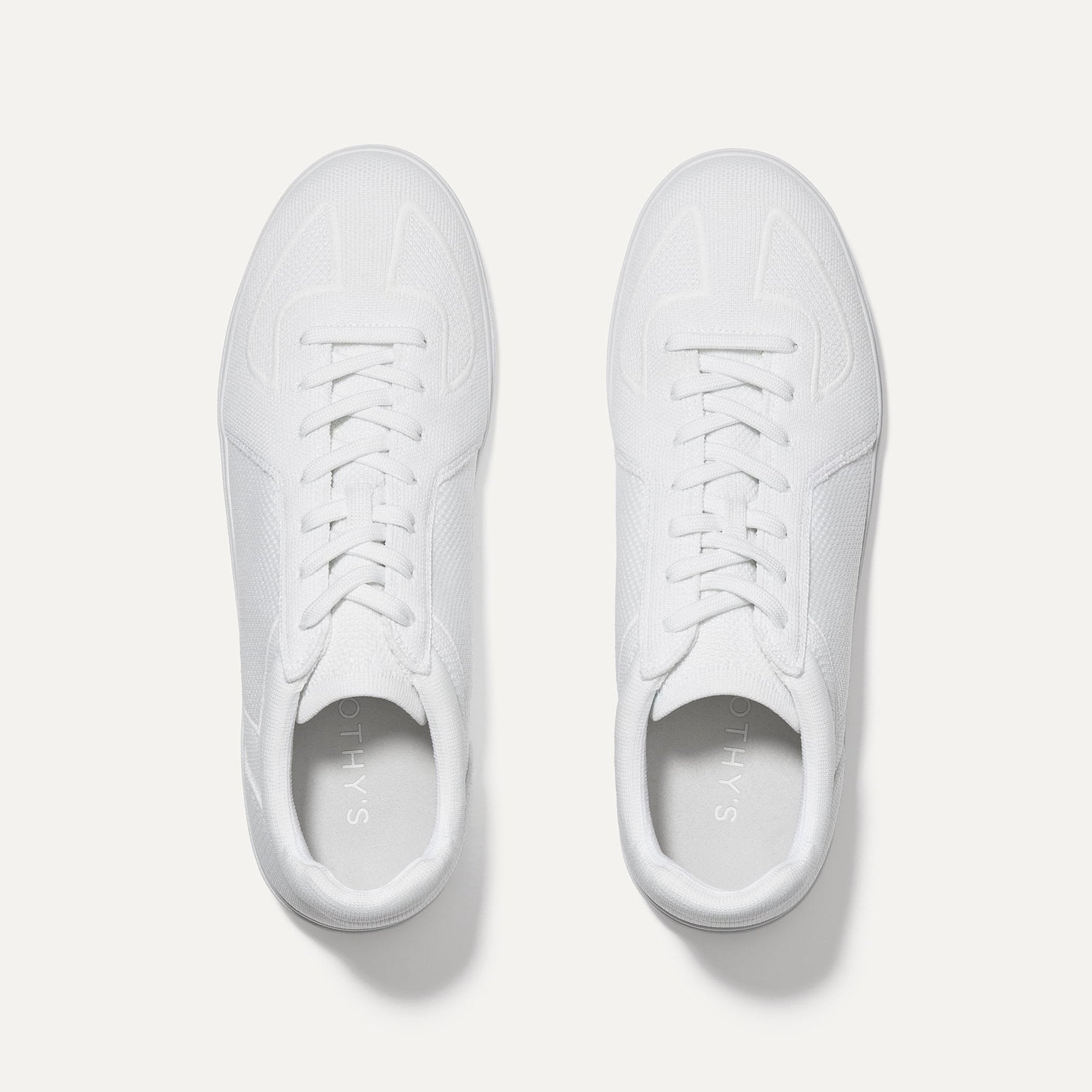 A pair of The RS01 Sneaker in White shown from the top.