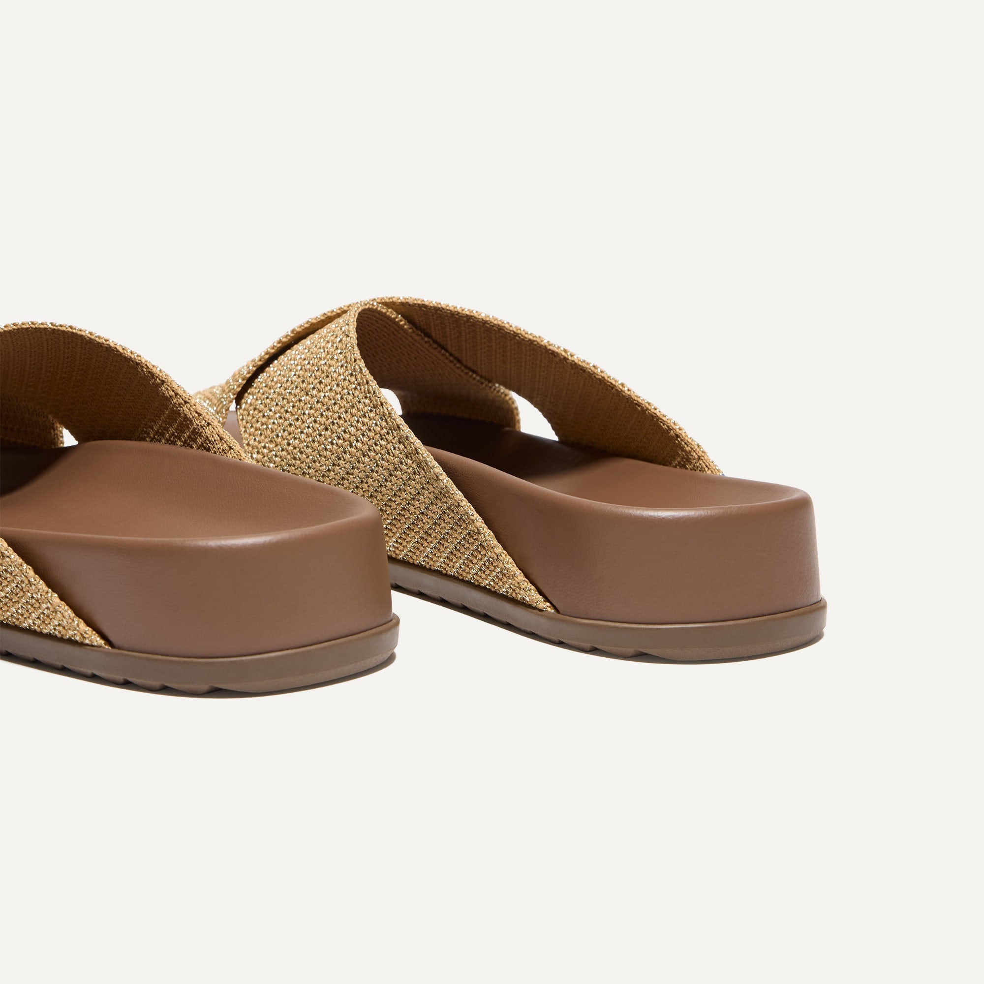 Close up of the heel of The Weekend Slide in Golden Sun.