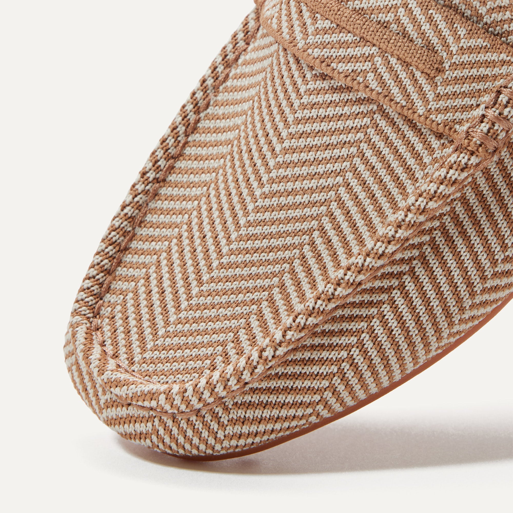 Close up of the toe and vamp of The Driver in Tan Herringbone.