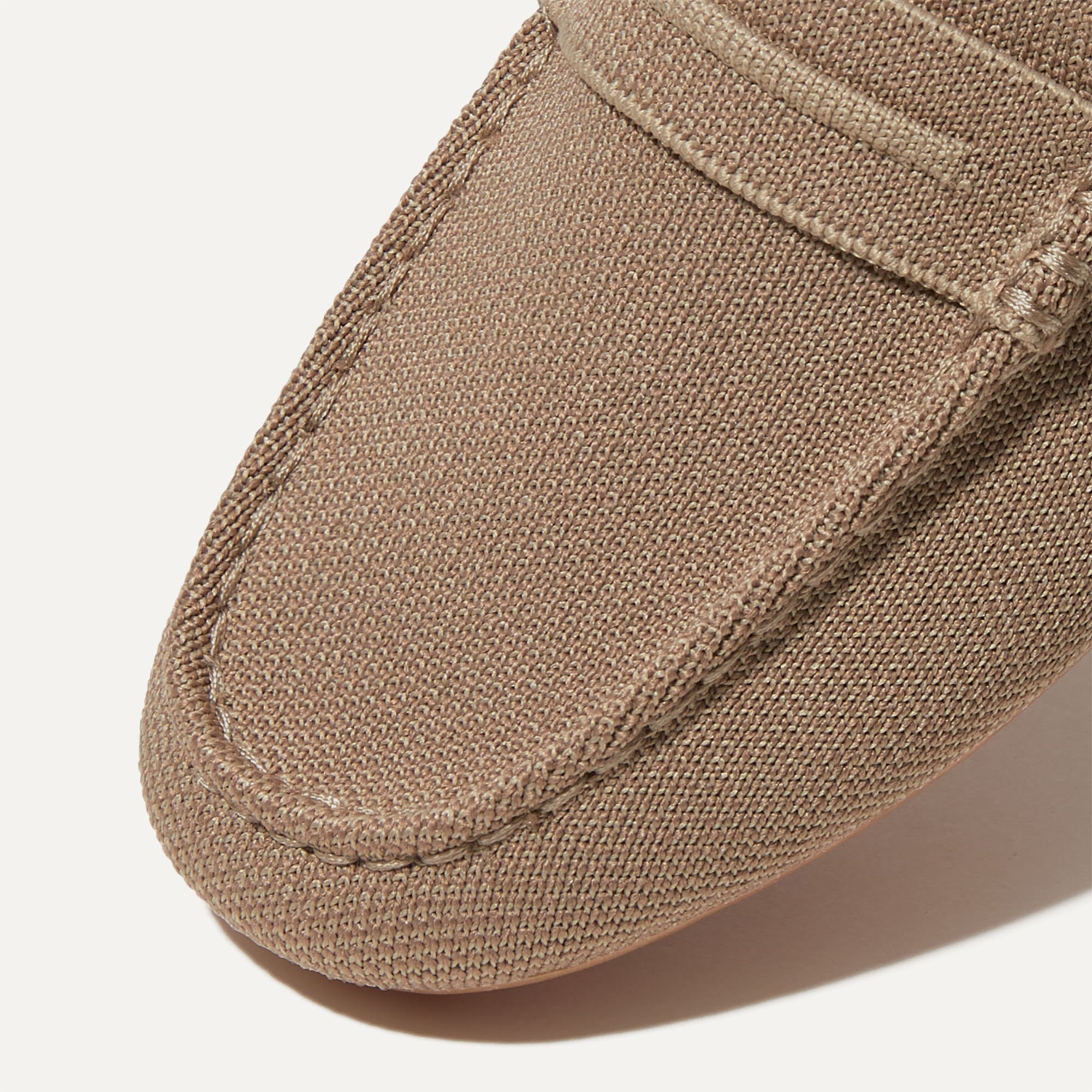 Close up of the toe and vamp of The Driver in Latte.