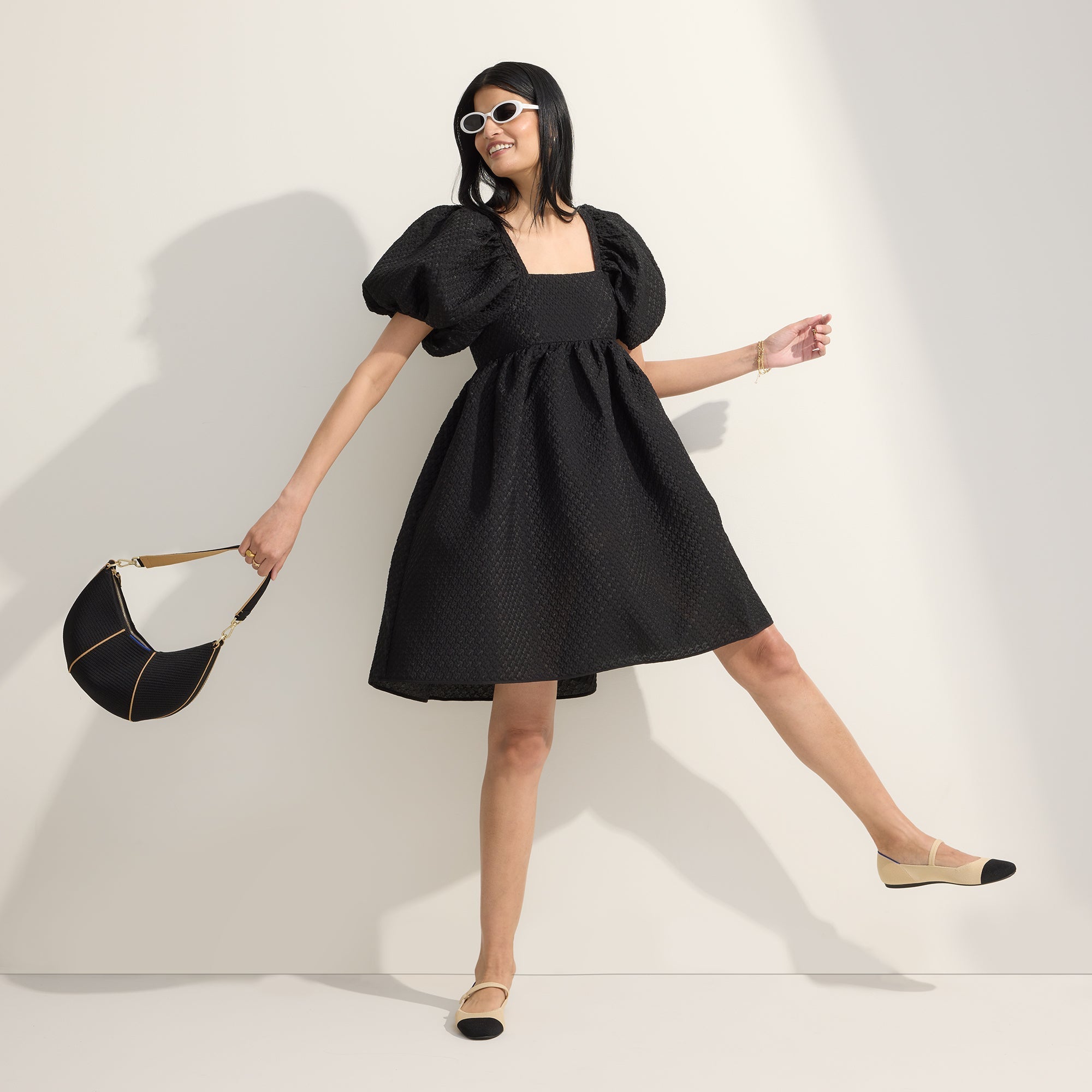 Alternate view of a model wearing The Square Mary Jane in Cream Captoe.