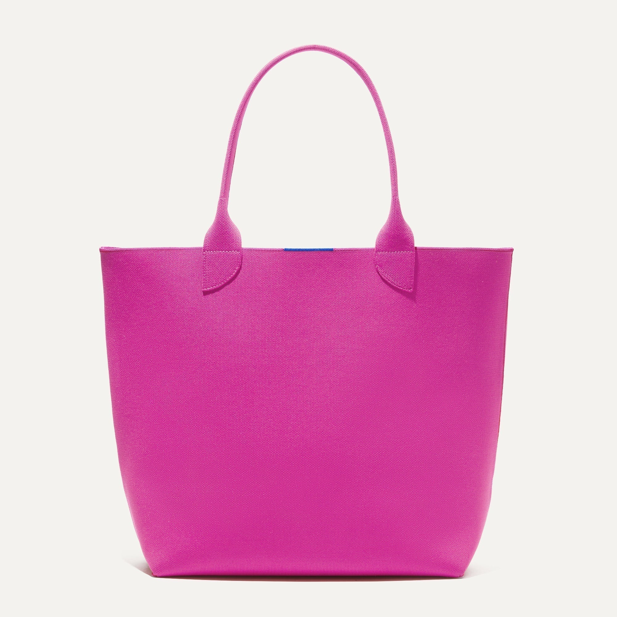 PDP |The Lightweight Tote in Dragon Fruit shown from the front.