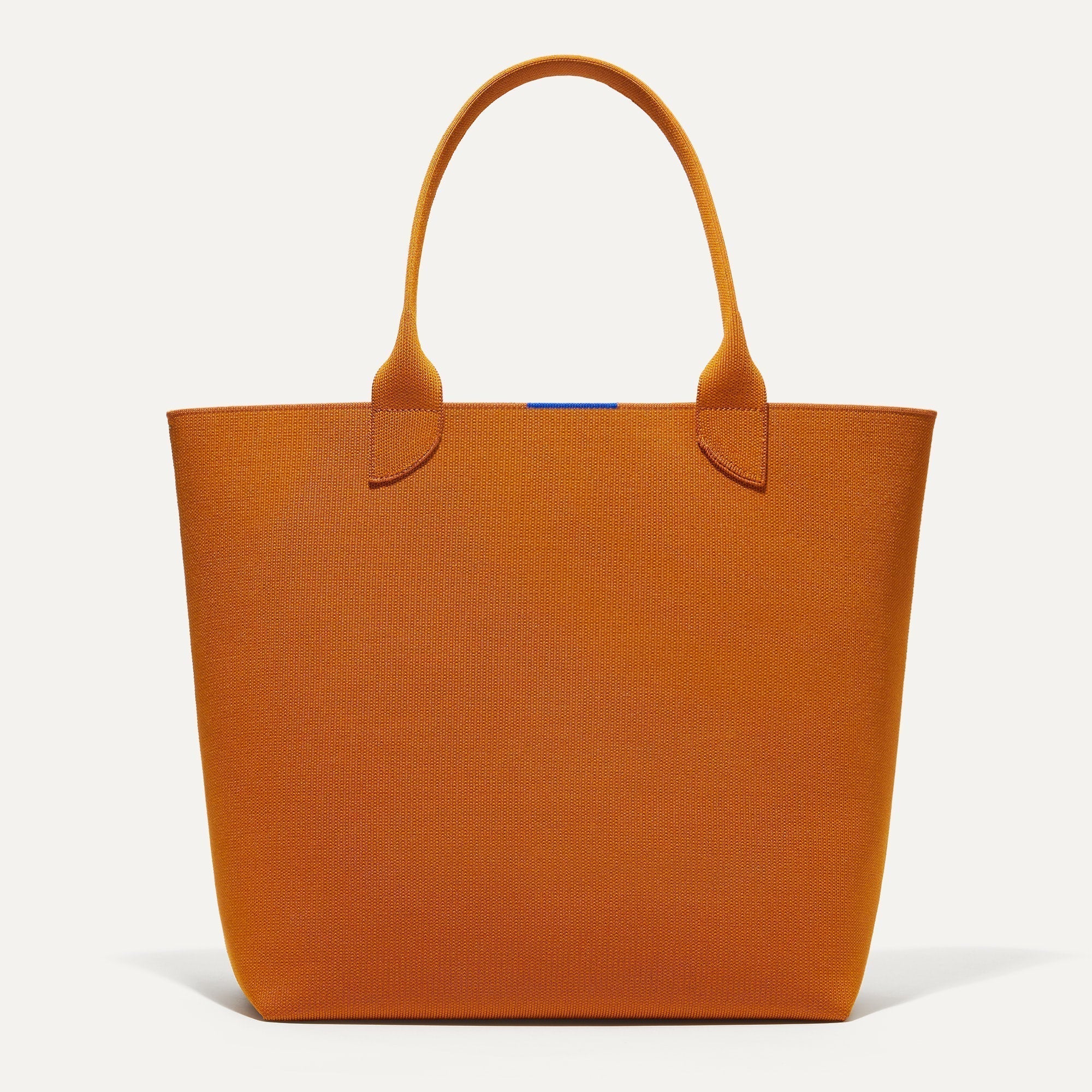 PLP |The Lightweight Tote in Amber shown from the front.