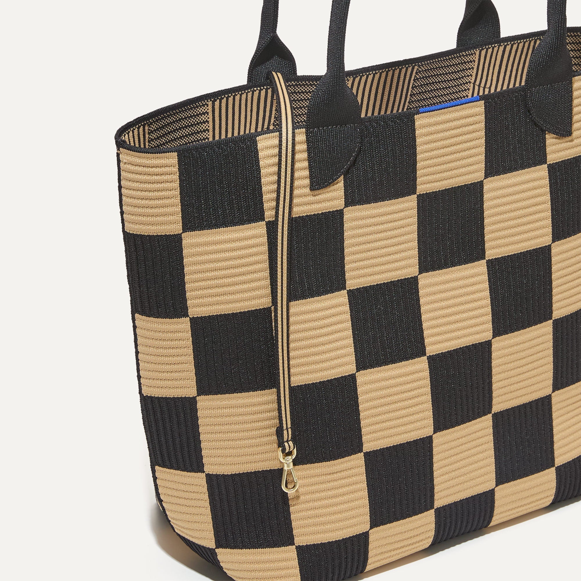 The Lightweight Tote in Checker Classic shown with its handy key leash.
