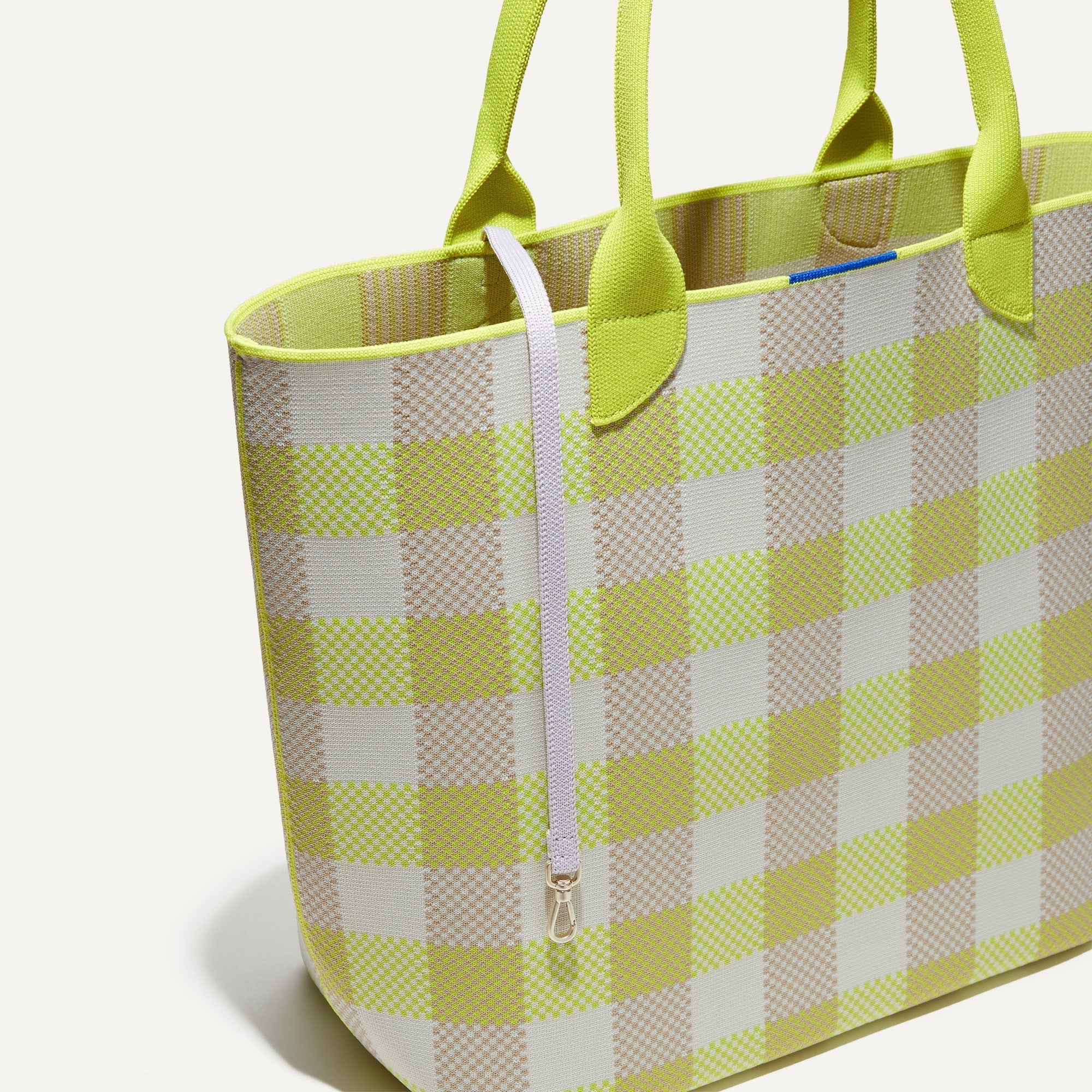 The Lightweight Tote in Citrus Gingham shown with its handy key leash.