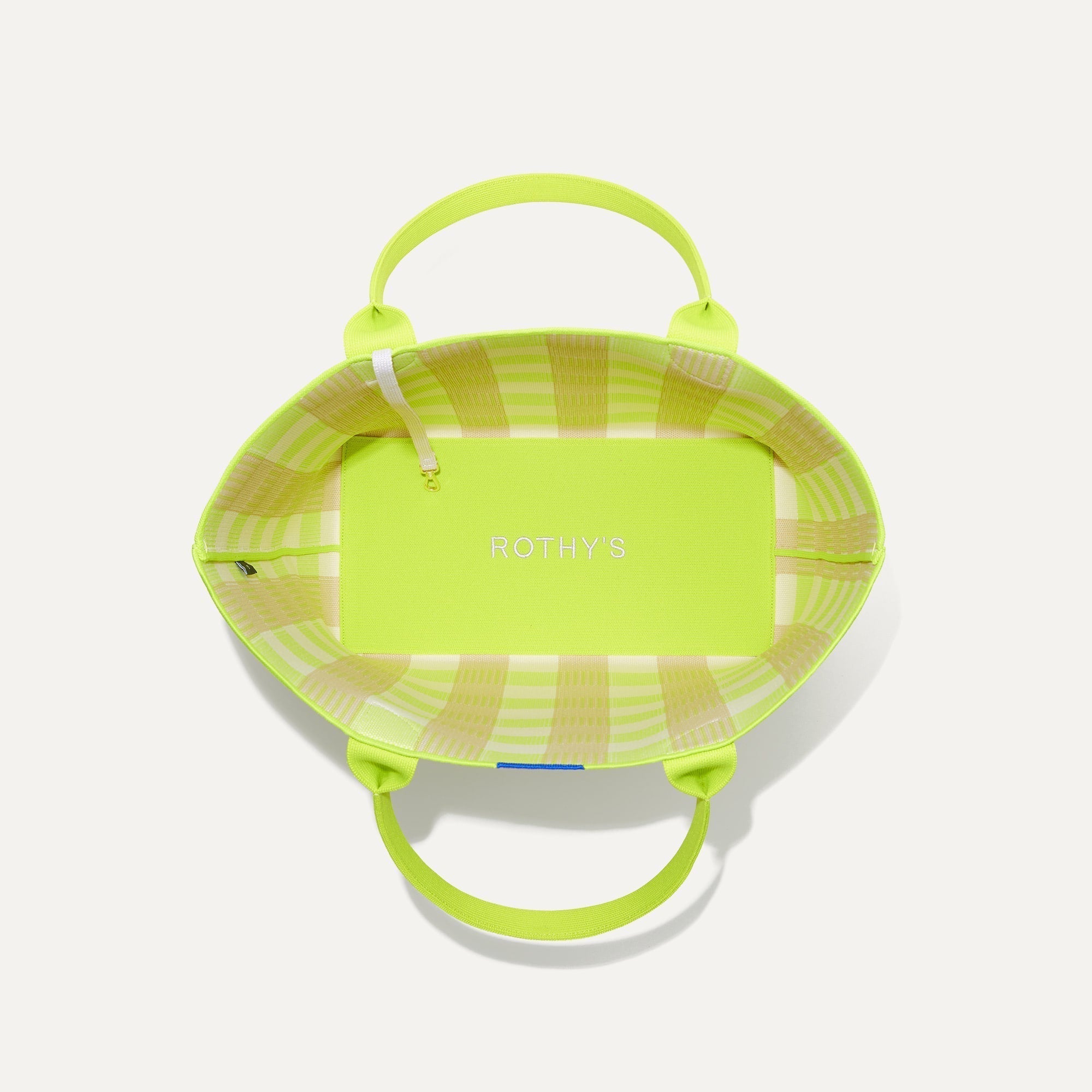 The Lightweight Tote in Citrus Gingham shown open from the top, with base insert visible. 