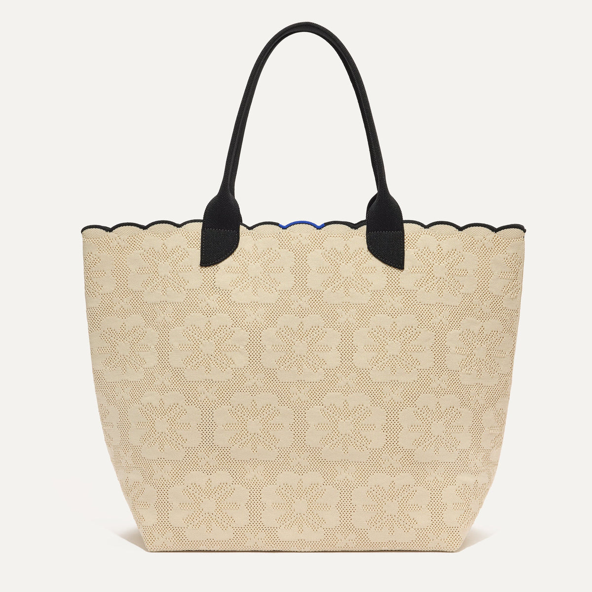 PLP |The Lightweight Tote in Ivory Carnation shown from the front.