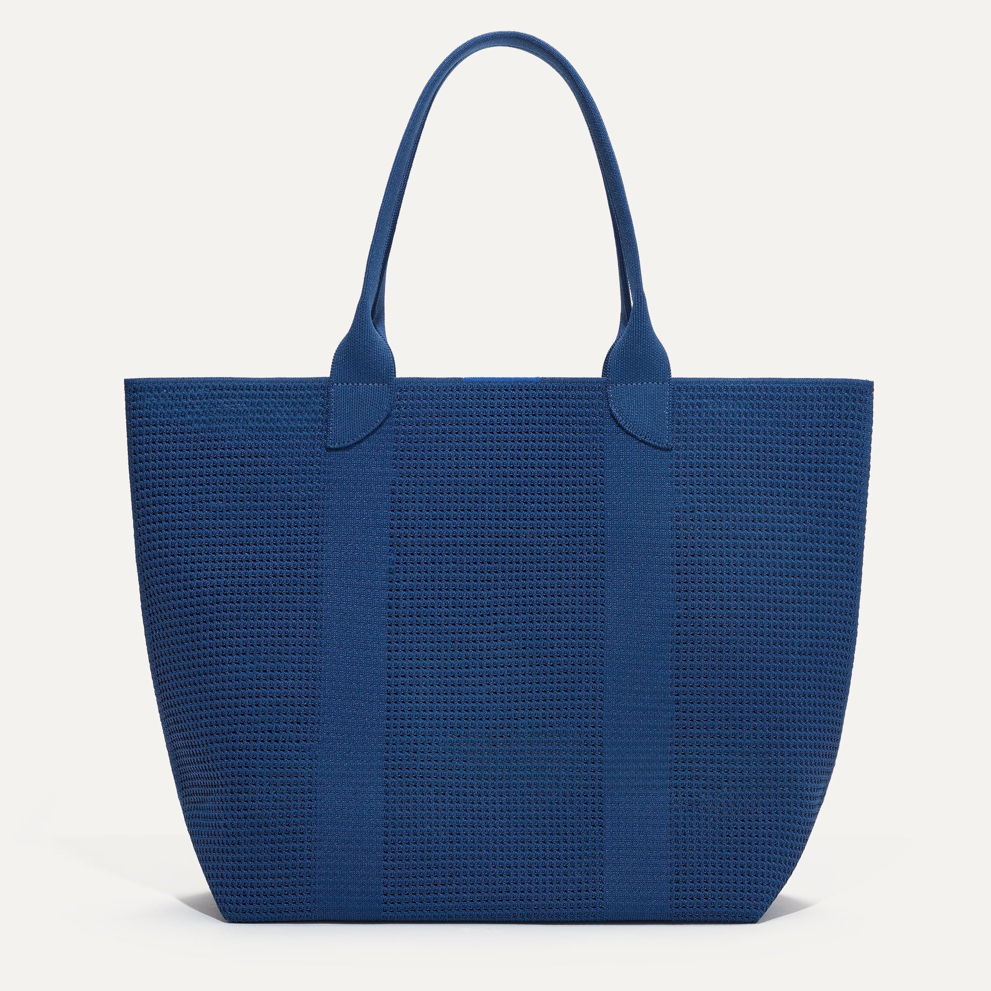 PLP |The Lightweight Tote in Ocean Blue shown from the front.