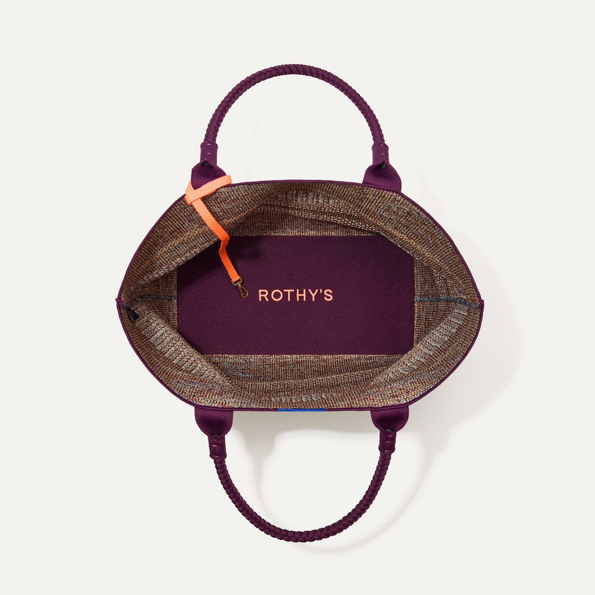 The Lightweight Tote in Revive Mélange shown open from the top, with interior visible. 