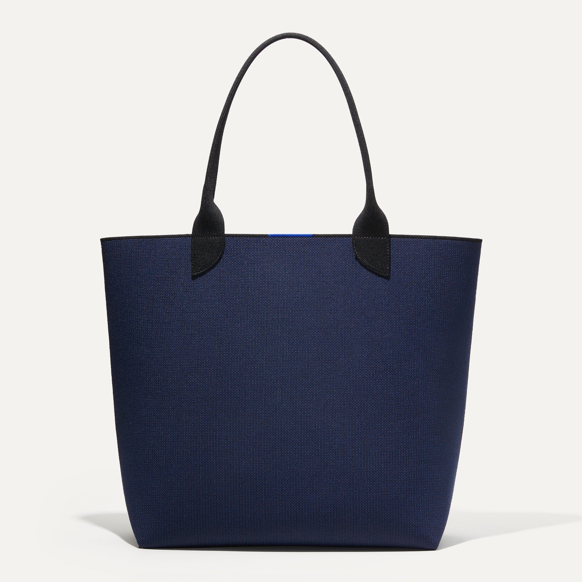 PDP |The Lightweight Tote in Sapphire and Onyx shown from the front.