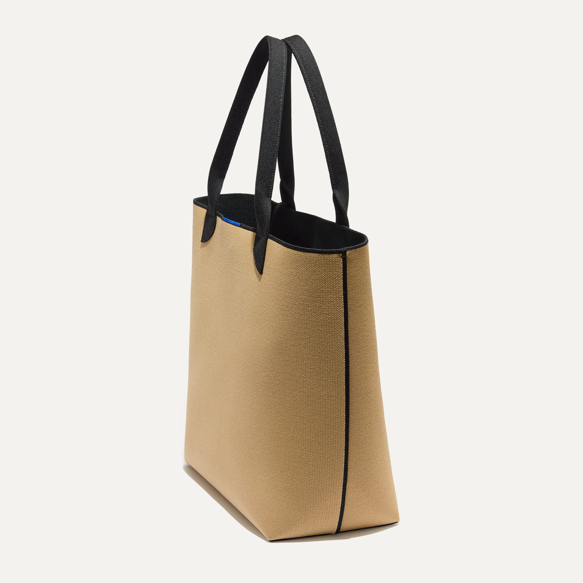The Lightweight Tote in Shortbread shown in diagonal view.